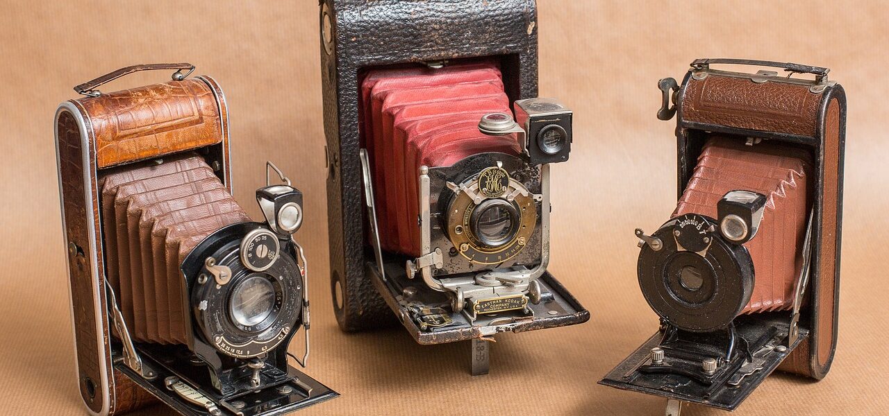 3 old cameras